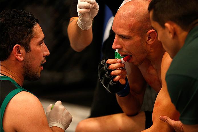 BUENOS AIRES, ARGENTINA - MAY 28: Fabian Quintana receives advice from his corner inbetween rounds while facing Alejandro Martinez during the filming of The Ultimate Fighter Latin America: Team Liddell vs Team Griffin on May 28, 2016 in Buenos Aires, Arg