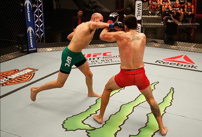 BUENOS AIRES, ARGENTINA - MAY 28:  (L-R) Fabian Quintana punches Alejandro Martinez during the filming of The Ultimate Fighter Latin America: Team Liddell vs Team Griffin on May 28, 2016 in Buenos Aires, Argentina. (Photo by Gabriel Rossi/Zuffa LLC/Zuffa 