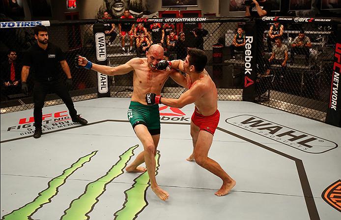 BUENOS AIRES, ARGENTINA - MAY 28:  (R-L) Alejandro Martinez punches Fabian Quintana during the filming of The Ultimate Fighter Latin America: Team Liddell vs Team Griffin on May 28, 2016 in Buenos Aires, Argentina. (Photo by Gabriel Rossi/Zuffa LLC/Zuffa 