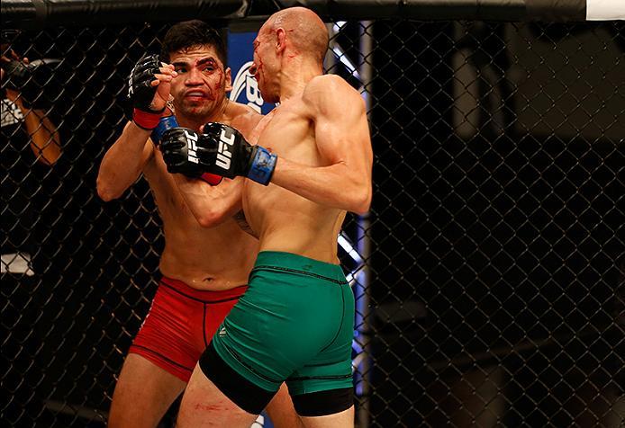 BUENOS AIRES, ARGENTINA - MAY 28:  (R-L) Fabian Quintana punches Alejandro Martinez during the filming of The Ultimate Fighter Latin America: Team Liddell vs Team Griffin on May 28, 2016 in Buenos Aires, Argentina. (Photo by Gabriel Rossi/Zuffa LLC/Zuffa 