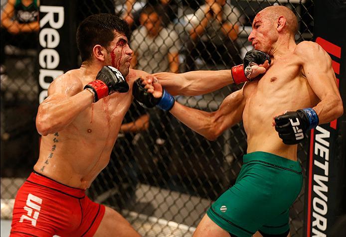 BUENOS AIRES, ARGENTINA - MAY 28: (L-R) Alejandro Martinez punches Fabian Quintana during the filming of The Ultimate Fighter Latin America: Team Liddell vs Team Griffin on May 28, 2016 in Buenos Aires, Argentina. (Photo by Gabriel Rossi/Zuffa LLC/Zuffa