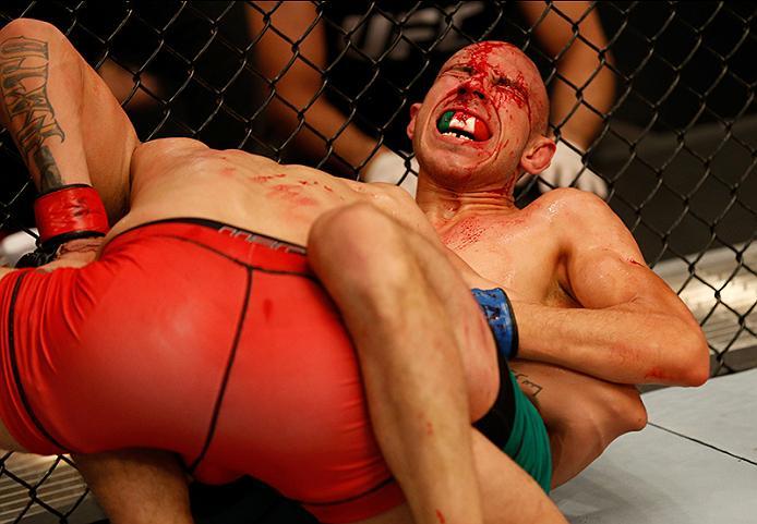 BUENOS AIRES, ARGENTINA - MAY 28: (R-L) Fabian Quintana attempts to submit Alejandro Martinez during the filming of The Ultimate Fighter Latin America: Team Liddell vs Team Griffin on May 28, 2016 in Buenos Aires, Argentina. (Photo by Gabriel Rossi/Zuffa