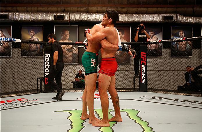 BUENOS AIRES, ARGENTINA - MAY 28:  (R-L) Alejandro Martinez hugs Fabian Quintana during the filming of The Ultimate Fighter Latin America: Team Liddell vs Team Griffin on May 28, 2016 in Buenos Aires, Argentina. (Photo by Gabriel Rossi/Zuffa LLC/Zuffa LLC