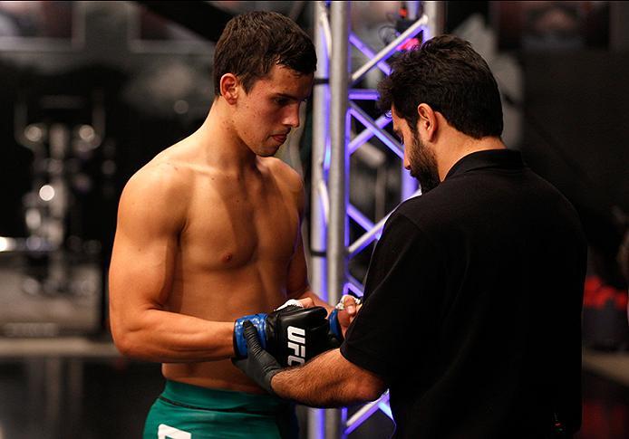 BUENOS AIRES, ARGENTINA - JUNE 11: Claudio Puelles prepares to enter the Octagon before facing Marcelo Rojo during the filming of The Ultimate Fighter Latin America: Team Liddell vs Team Griffin on June 11, 2016 in Buenos Aires, Argentina. (Photo by Gabr