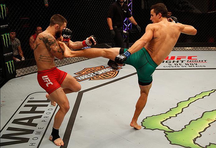 BUENOS AIRES, ARGENTINA - JUNE 11: (R-L) Claudio Puelles kicks Marcelo Rojo during the filming of The Ultimate Fighter Latin America: Team Liddell vs Team Griffin on June 11, 2016 in Buenos Aires, Argentina. (Photo by Gabriel Rossi/Zuffa LLC/Zuffa LLC vi