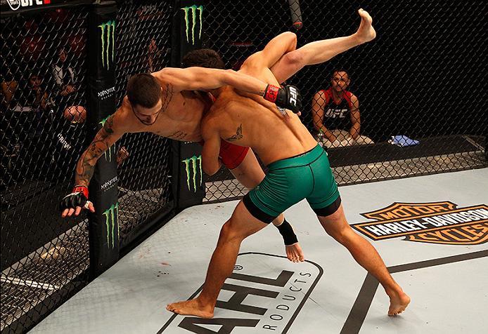 BUENOS AIRES, ARGENTINA - JUNE 11: (R-L) Claudio Puelles takes down Marcelo Rojo during the filming of The Ultimate Fighter Latin America: Team Liddell vs Team Griffin on June 11, 2016 in Buenos Aires, Argentina. (Photo by Gabriel Rossi/Zuffa LLC/Zuffa L