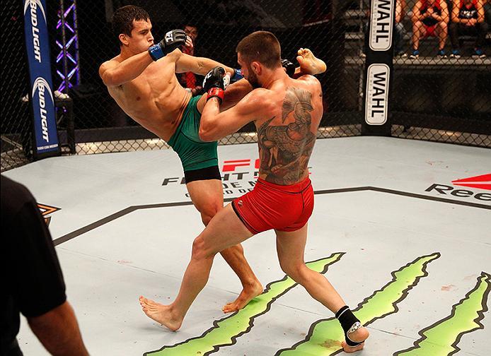 BUENOS AIRES, ARGENTINA - JUNE 11: (L-R) Claudio Puelles kicks Marcelo Rojo during the filming of The Ultimate Fighter Latin America: Team Liddell vs Team Griffin on June 11, 2016 in Buenos Aires, Argentina. (Photo by Gabriel Rossi/Zuffa LLC/Zuffa LLC vi