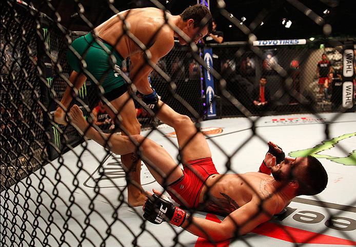 BUENOS AIRES, ARGENTINA - JUNE 11: (L-R) Claudio Puelles takes down Marcelo Rojo during the filming of The Ultimate Fighter Latin America: Team Liddell vs Team Griffin on June 11, 2016 in Buenos Aires, Argentina. (Photo by Gabriel Rossi/Zuffa LLC/Zuffa L
