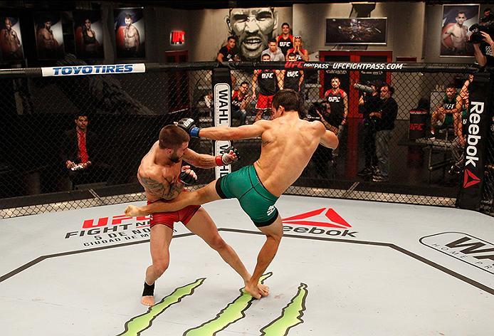 BUENOS AIRES, ARGENTINA - JUNE 11: (R-L) Claudio Puelles kicks Marcelo Rojo during the filming of The Ultimate Fighter Latin America: Team Liddell vs Team Griffin on June 11, 2016 in Buenos Aires, Argentina. (Photo by Gabriel Rossi/Zuffa LLC/Zuffa LLC vi