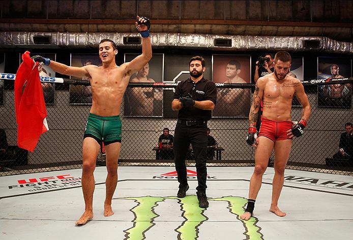 BUENOS AIRES, ARGENTINA - JUNE 11: (L-R) Claudio Puelles celebrates his victory over Marcelo Rojo during the filming of The Ultimate Fighter Latin America: Team Liddell vs Team Griffin on June 11, 2016 in Buenos Aires, Argentina. (Photo by Gabriel Rossi/