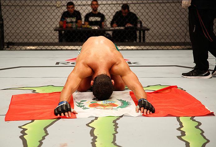BUENOS AIRES, ARGENTINA - JUNE 11: Claudio Puelles celebrates his victory over Marcelo Rojo during the filming of The Ultimate Fighter Latin America: Team Liddell vs Team Griffin on June 11, 2016 in Buenos Aires, Argentina. (Photo by Gabriel Rossi/Zuffa
