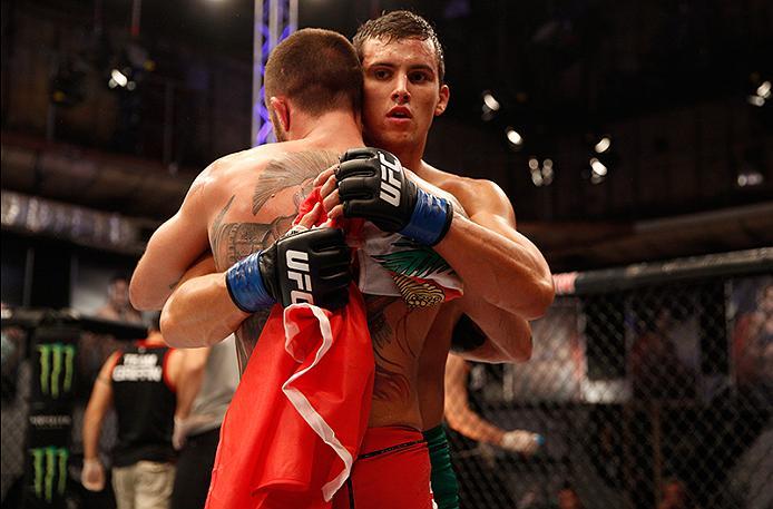 BUENOS AIRES, ARGENTINA - JUNE 11: (R-L) Claudio Puelles hugs Marcelo Rojo during the filming of The Ultimate Fighter Latin America: Team Liddell vs Team Griffin on June 11, 2016 in Buenos Aires, Argentina. (Photo by Gabriel Rossi/Zuffa LLC/Zuffa LLC via