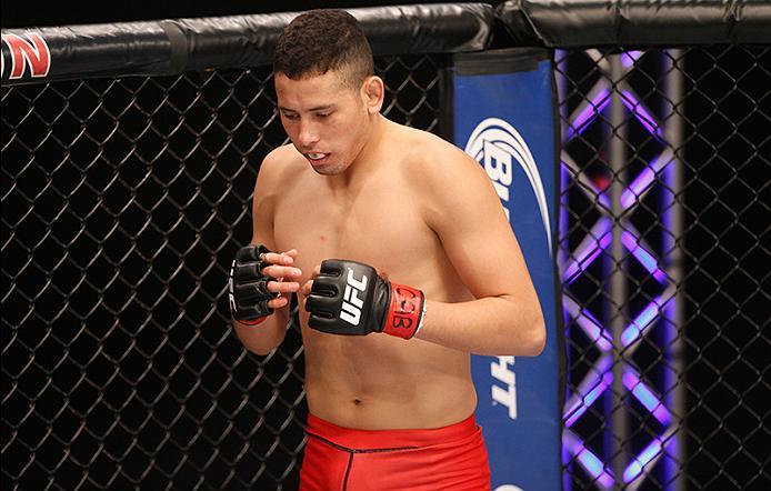 BUENOS AIRES, ARGENTINA - JUNE 11: Martin Bravo enters the Octagon before facing Leonardo Rodriguez during the filming of The Ultimate Fighter Latin America: Team Liddell vs Team Griffin on June 11, 2016 in Buenos Aires, Argentina. (Photo by Gabriel Ross