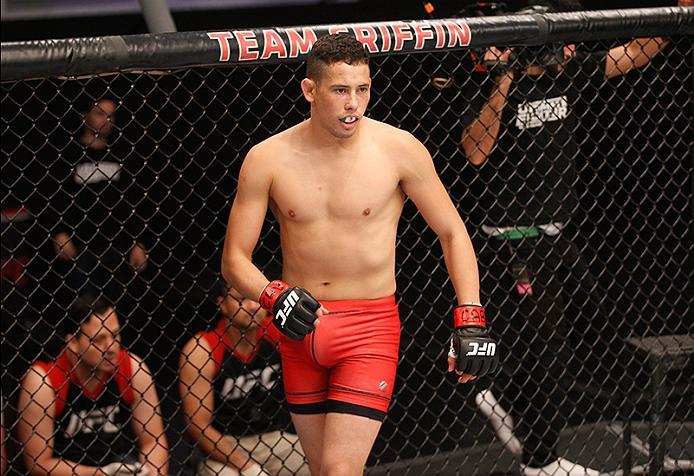 BUENOS AIRES, ARGENTINA - JUNE 11: Martin Bravo enters the Octagon before facing Leonardo Rodriguez during the filming of The Ultimate Fighter Latin America: Team Liddell vs Team Griffin on June 11, 2016 in Buenos Aires, Argentina. (Photo by Gabriel Ross