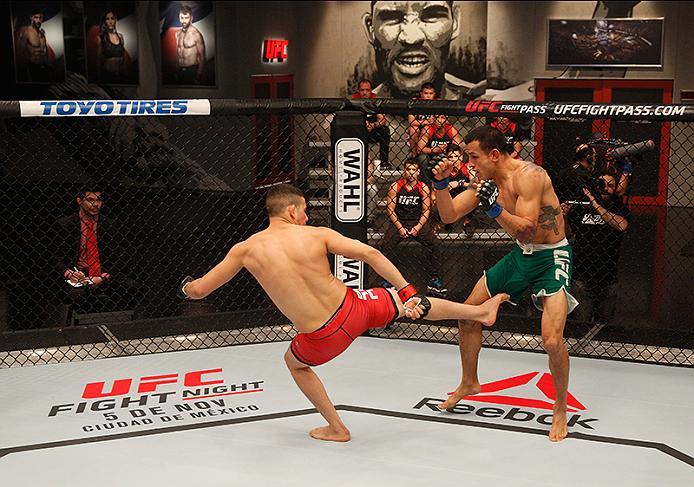 BUENOS AIRES, ARGENTINA - JUNE 11: (L-R) Martin Bravo kicks Leonardo Rodriguez during the filming of The Ultimate Fighter Latin America: Team Liddell vs Team Griffin on June 11, 2016 in Buenos Aires, Argentina. (Photo by Gabriel Rossi/Zuffa LLC/Zuffa LLC