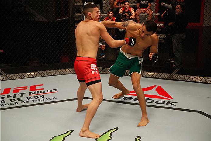 BUENOS AIRES, ARGENTINA - JUNE 11: (R-L) Leonardo Rodriguez punches Martin Bravo during the filming of The Ultimate Fighter Latin America: Team Liddell vs Team Griffin on June 11, 2016 in Buenos Aires, Argentina. (Photo by Gabriel Rossi/Zuffa LLC/Zuffa L