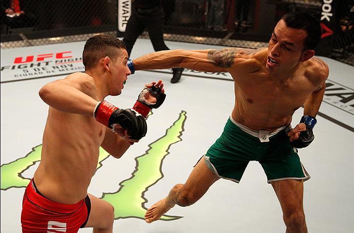 BUENOS AIRES, ARGENTINA - JUNE 11: (R-L) Leonardo Rodriguez punches Martin Bravo during the filming of The Ultimate Fighter Latin America: Team Liddell vs Team Griffin on June 11, 2016 in Buenos Aires, Argentina. (Photo by Gabriel Rossi/Zuffa LLC/Zuffa L