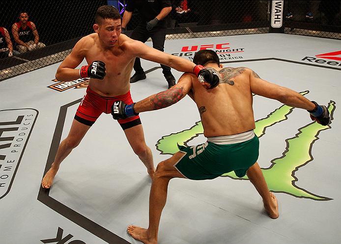 BUENOS AIRES, ARGENTINA - JUNE 11: (L-R) Martin Bravo punches Leonardo Rodriguez during the filming of The Ultimate Fighter Latin America: Team Liddell vs Team Griffin on June 11, 2016 in Buenos Aires, Argentina. (Photo by Gabriel Rossi/Zuffa LLC/Zuffa L