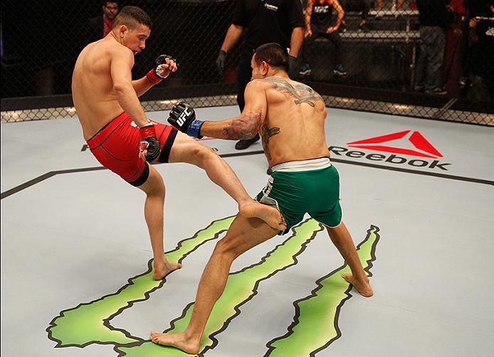 BUENOS AIRES, ARGENTINA - JUNE 11: (L-R) Martin Bravo kicks Leonardo Rodriguez during the filming of The Ultimate Fighter Latin America: Team Liddell vs Team Griffin on June 11, 2016 in Buenos Aires, Argentina. (Photo by Gabriel Rossi/Zuffa LLC/Zuffa LLC