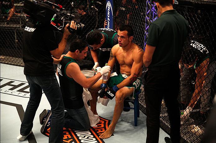 BUENOS AIRES, ARGENTINA - JUNE 11: Leonardo Rodriguez receives advice from his corner in-between rounds while facing Martin Bravo during the filming of The Ultimate Fighter Latin America: Team Liddell vs Team Griffin on June 11, 2016 in Buenos Aires, Arg