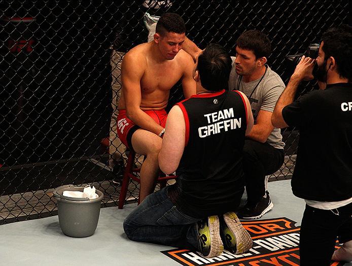 BUENOS AIRES, ARGENTINA - JUNE 11: Martin Bravo receives advice from his corner in-between rounds while facing Leonardo Rodriguez during the filming of The Ultimate Fighter Latin America: Team Liddell vs Team Griffin on June 11, 2016 in Buenos Aires, Arg
