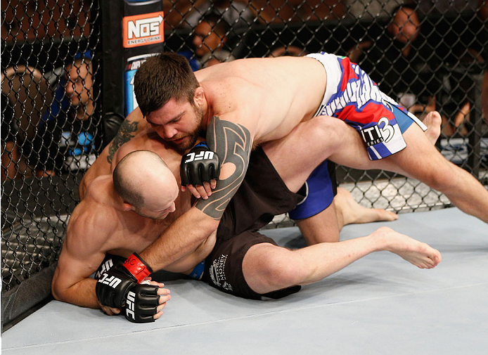 LAS VEGAS, NV - JULY 06:  Robert Drysdale (top) grapples with Keith Berish in their light heavyweight fight during the The Ultimate Fighter Finale inside the Mandalay Bay Events Center on July 6, 2014 in Las Vegas, Nevada.  (Photo by Josh Hedges/Zuffa LLC