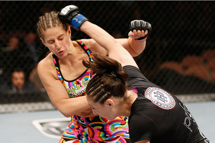 LAS VEGAS, NV - JULY 06:  (R-L) Alexis Dufresne punches Sarah Moras in their women's bantamweight fight during the Ultimate Fighter Finale inside the Mandalay Bay Events Center on July 6, 2014 in Las Vegas, Nevada.  (Photo by Josh Hedges/Zuffa LLC/Zuffa L