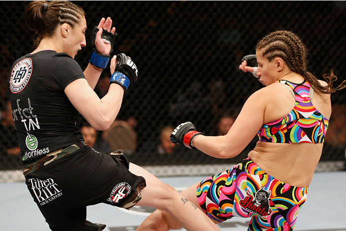 LAS VEGAS, NV - JULY 06: (R-L) Sarah Moras kicks Alexis Dufresne in their women's bantamweight fight during the Ultimate Fighter Finale inside the Mandalay Bay Events Center on July 6, 2014 in Las Vegas, Nevada. (Photo by Josh Hedges/Zuffa LLC/Zuffa LLC