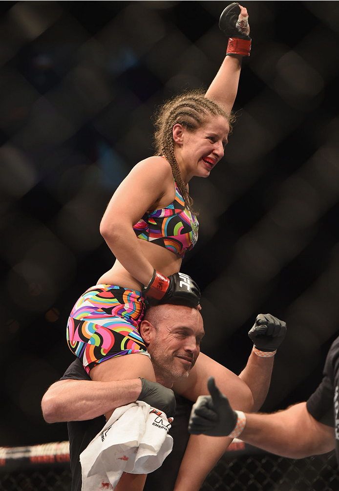 LAS VEGAS, NV - JULY 06:  Sarah Moras reacts to her win over Alexis Dufresne in their women's bantamweight fight during the Ultimate Fighter Finale inside the Mandalay Bay Events Center on July 6, 2014 in Las Vegas, Nevada.  (Photo by Jeff Bottari/Zuffa L