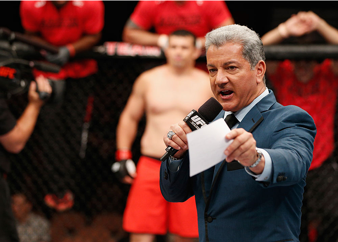 LAS VEGAS, NV - JULY 06:  Bruce Buffer announces the light heavyweight fight between Patrick Walsh and Daniel Spohn during the Ultimate Fighter Finale inside the Mandalay Bay Events Center on July 6, 2014 in Las Vegas, Nevada.  (Photo by Josh Hedges/Zuffa