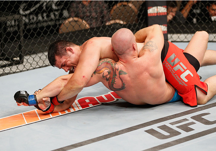 LAS VEGAS, NV - JULY 06:  Patrick Walsh (top) attempts to submit Daniel Spohn in their light heavyweight fight during the Ultimate Fighter Finale inside the Mandalay Bay Events Center on July 6, 2014 in Las Vegas, Nevada.  (Photo by Josh Hedges/Zuffa LLC/