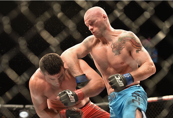 LAS VEGAS, NV - JULY 06:  (R-L) Daniel Spohn punches Patrick Walsh in their light heavyweight fight during the Ultimate Fighter Finale inside the Mandalay Bay Events Center on July 6, 2014 in Las Vegas, Nevada.  (Photo by Jeff Bottari/Zuffa LLC/Zuffa LLC 