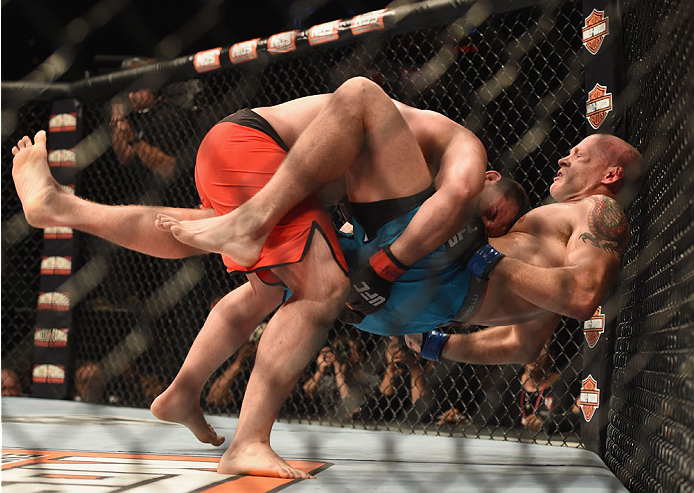 LAS VEGAS, NV - JULY 06: (L-R) Patrick Walsh takes down Daniel Spohn in their light heavyweight fight during the Ultimate Fighter Finale inside the Mandalay Bay Events Center on July 6, 2014 in Las Vegas, Nevada. (Photo by Jeff Bottari/Zuffa LLC/Zuffa L