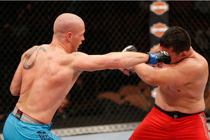 LAS VEGAS, NV - JULY 06: (L-R) Daniel Spohn punches Patrick Walsh in their light heavyweight fight during the Ultimate Fighter Finale inside the Mandalay Bay Events Center on July 6, 2014 in Las Vegas, Nevada. (Photo by Josh Hedges/Zuffa LLC/Zuffa LLC v
