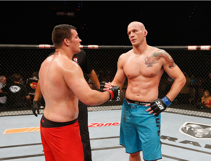 LAS VEGAS, NV - JULY 06: (R-L) Daniel Spohn congratulates Patrick Walsh in their light heavyweight fight during the Ultimate Fighter Finale inside the Mandalay Bay Events Center on July 6, 2014 in Las Vegas, Nevada. (Photo by Josh Hedges/Zuffa LLC/Zuff