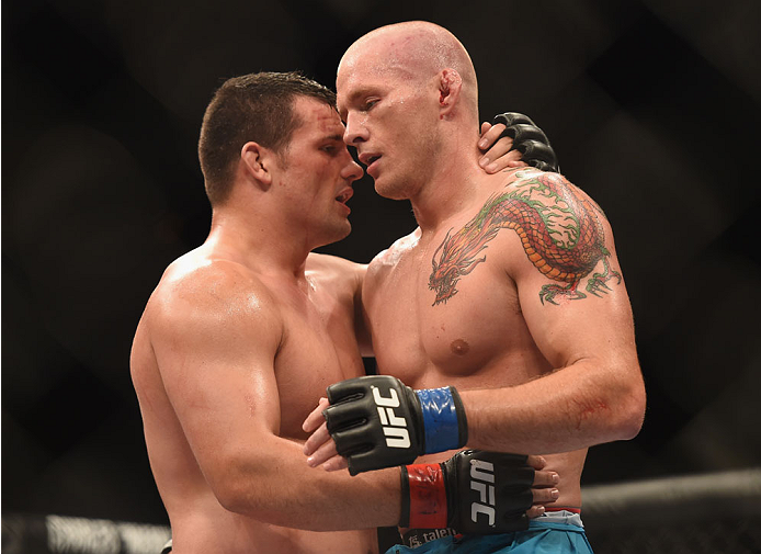 LAS VEGAS, NV - JULY 06:  (R-L) Daniel Spohn congratulates Patrick Walsh on his win in their light heavyweight fight during the Ultimate Fighter Finale inside the Mandalay Bay Events Center on July 6, 2014 in Las Vegas, Nevada.  (Photo by Jeff Bottari/Zuf