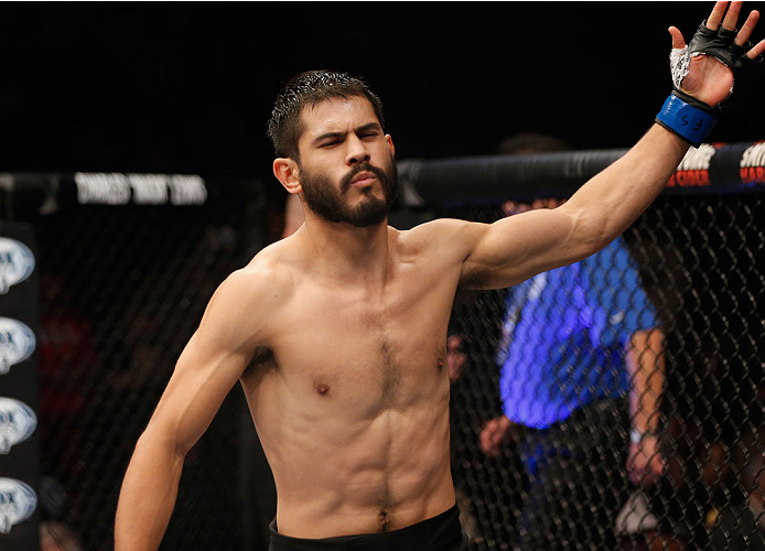 LAS VEGAS, NV - JULY 06: Juan Manuel Puig Carreon enters the Octagon for his lightweight fight during the Ultimate Fighter Finale inside the Mandalay Bay Events Center on July 6, 2014 in Las Vegas, Nevada. (Photo by Josh Hedges/Zuffa LLC/Zuffa LLC via G