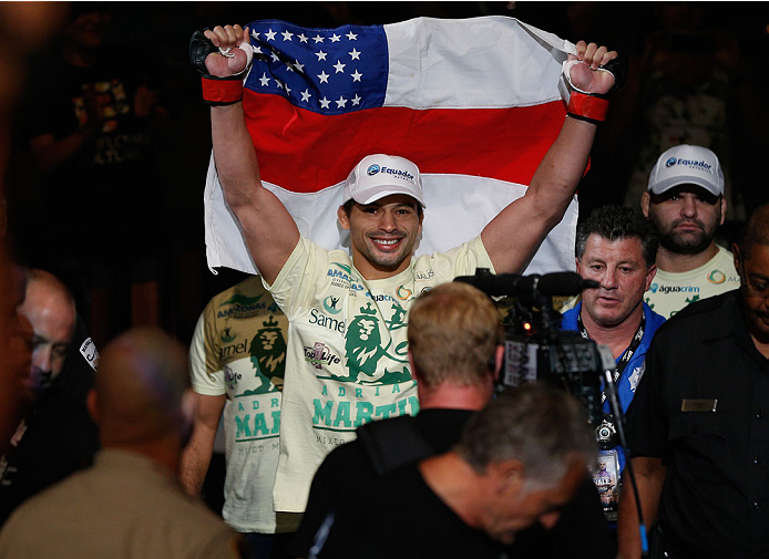LAS VEGAS, NV - JULY 06: Adriano Martins enters the Octagon for his lightweight fight during the Ultimate Fighter Finale inside the Mandalay Bay Events Center on July 6, 2014 in Las Vegas, Nevada. (Photo by Josh Hedges/Zuffa LLC/Zuffa LLC via Getty Imag