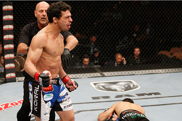 LAS VEGAS, NV - JULY 06:  Adriano Martins celebrates after knocking out Juan Maneul Puig Carreon in their lightweight fight during the Ultimate Fighter Finale inside the Mandalay Bay Events Center on July 6, 2014 in Las Vegas, Nevada.  (Photo by Josh Hedg