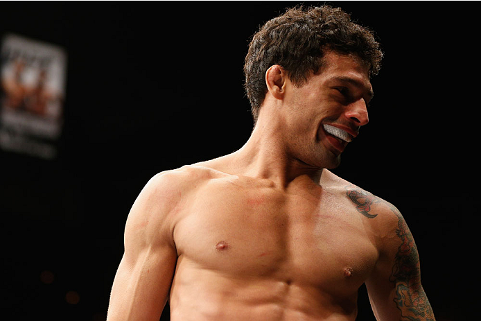 LAS VEGAS, NV - JULY 06:  Adriano Martins celebrates after knocking out Juan Maneul Puig Carreon in their lightweight fight during the Ultimate Fighter Finale inside the Mandalay Bay Events Center on July 6, 2014 in Las Vegas, Nevada.  (Photo by Josh Hedg