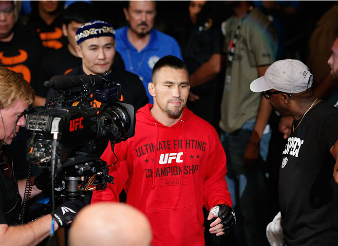 LAS VEGAS, NV - JULY 06: Jumabieke Tuerxun enters the Octagon in his bantamweight fight during the Ultimate Fighter Finale inside the Mandalay Bay Events Center on July 6, 2014 in Las Vegas, Nevada. (Photo by Josh Hedges/Zuffa LLC/Zuffa LLC via Getty Im