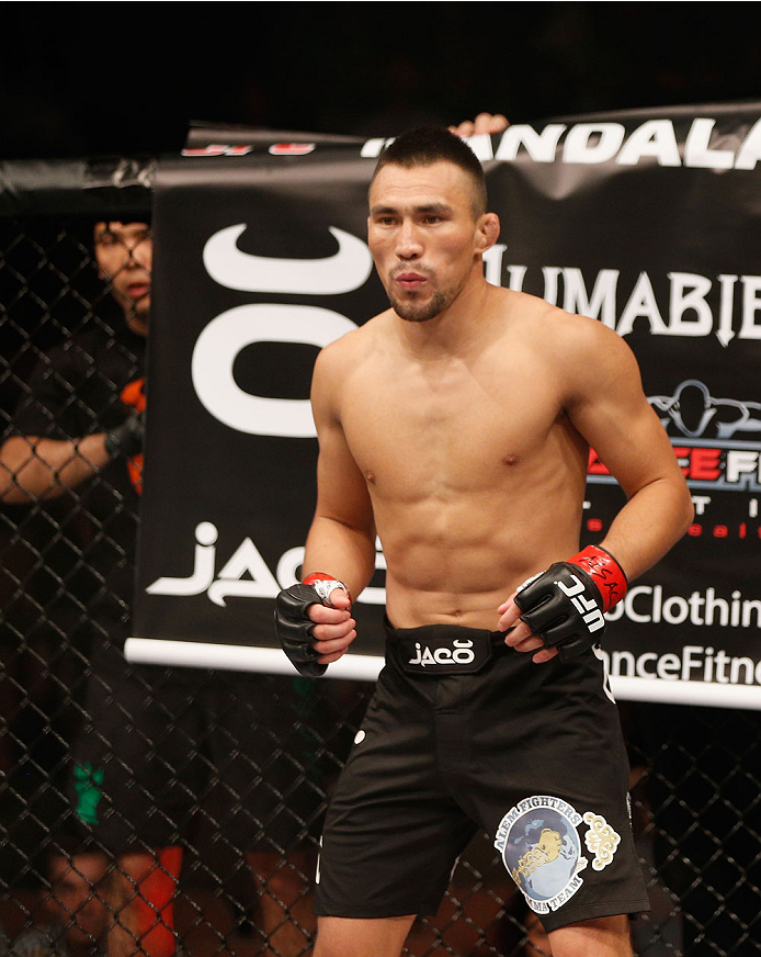 LAS VEGAS, NV - JULY 06:  Jumabieke Tuerxun enters the Octagon in his bantamweight fight during the Ultimate Fighter Finale inside the Mandalay Bay Events Center on July 6, 2014 in Las Vegas, Nevada.  (Photo by Josh Hedges/Zuffa LLC/Zuffa LLC via Getty Im