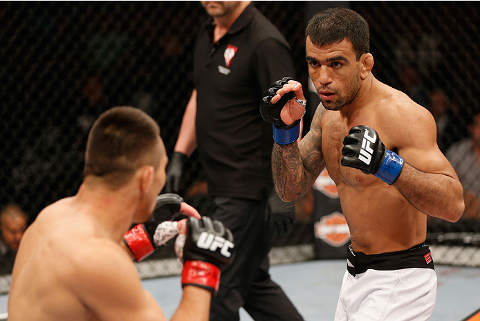LAS VEGAS, NV - JULY 06: (R-L) Leandro Issa squares off with Jumabieke Tuerxun in their bantamweight fight during the Ultimate Fighter Finale inside the Mandalay Bay Events Center on July 6, 2014 in Las Vegas, Nevada. (Photo by Josh Hedges/Zuffa LLC/Zuf
