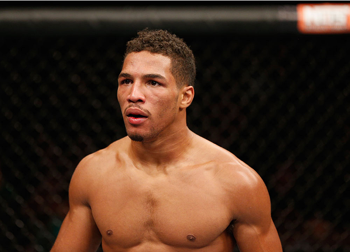 LAS VEGAS, NV - JULY 06:  Kevin Lee returns to his corner between rounds in his flyweight fight during the Ultimate Fighter Finale inside the Mandalay Bay Events Center on July 6, 2014 in Las Vegas, Nevada.  (Photo by Josh Hedges/Zuffa LLC/Zuffa LLC via G