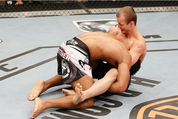 LAS VEGAS, NV - JULY 06: (R-L) Jesse Ronson attempts to submit Kevin Lee in their flyweight fight during the Ultimate Fighter Finale inside the Mandalay Bay Events Center on July 6, 2014 in Las Vegas, Nevada. (Photo by Josh Hedges/Zuffa LLC/Zuffa LLC vi