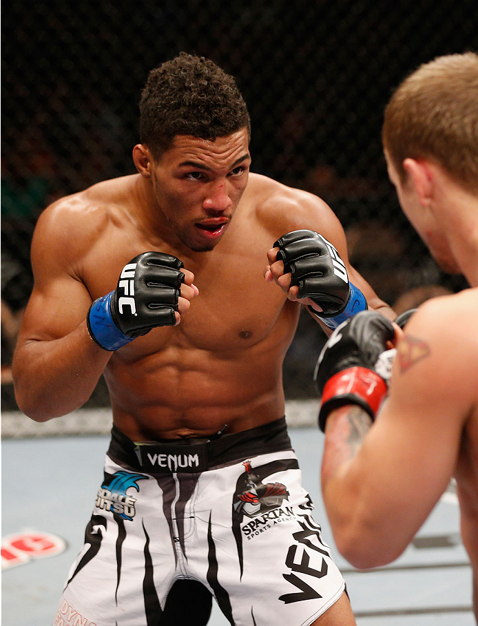 LAS VEGAS, NV - JULY 06:  (L-R) Kevin Lee squares off with Jesse Ronson in their flyweight fight during the Ultimate Fighter Finale inside the Mandalay Bay Events Center on July 6, 2014 in Las Vegas, Nevada.  (Photo by Josh Hedges/Zuffa LLC/Zuffa LLC via 