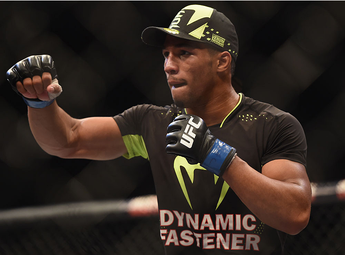 LAS VEGAS, NV - JULY 06:  Kevin Lee celebrates after defeating Jesse Ronson in their flyweight fight during the Ultimate Fighter Finale inside the Mandalay Bay Events Center on July 6, 2014 in Las Vegas, Nevada.  (Photo by Jeff Bottari/Zuffa LLC/Zuffa LLC