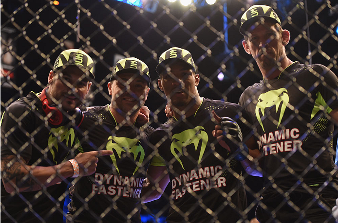 LAS VEGAS, NV - JULY 06:  Kevin Lee celebrates with his team after defeating Jesse Ronson in their flyweight fight during the Ultimate Fighter Finale inside the Mandalay Bay Events Center on July 6, 2014 in Las Vegas, Nevada.  (Photo by Jeff Bottari/Zuffa