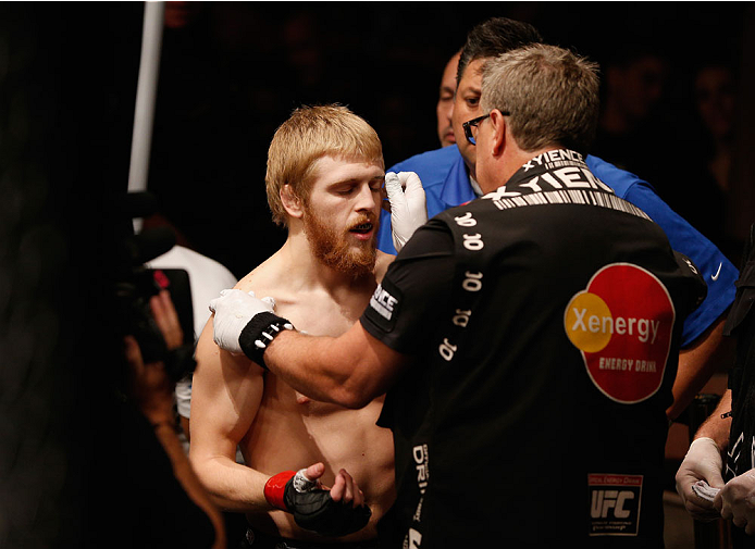 LAS VEGAS, NV - JULY 06: Justin Scoggins enters the Octagon to face Dustin Ortiz in their flyweight fight during the Ultimate Fighter Finale inside the Mandalay Bay Events Center on July 6, 2014 in Las Vegas, Nevada. (Photo by Josh Hedges/Zuffa LLC/Zuff