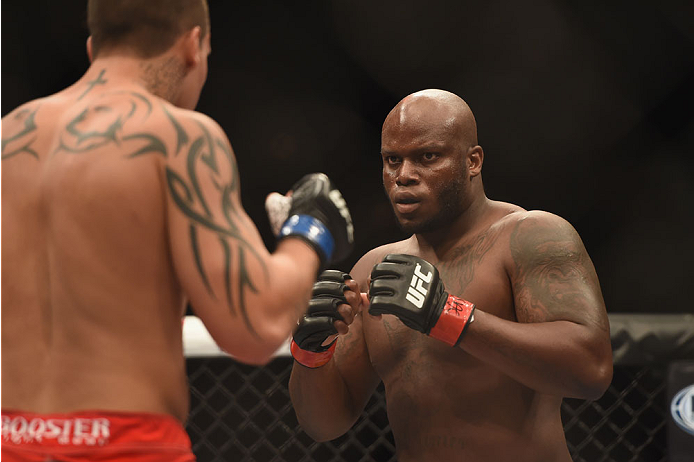 LAS VEGAS, NV - JULY 06: (R-L) Derrick Lewis squares off with Guto Inocente in their middleweight fight during the Ultimate Fighter Finale inside the Mandalay Bay Events Center on July 6, 2014 in Las Vegas, Nevada. (Photo by Jeff Bottari/Zuffa LLC/Zuffa